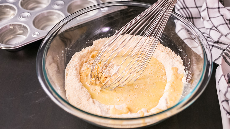 mixing corn batter in bowl