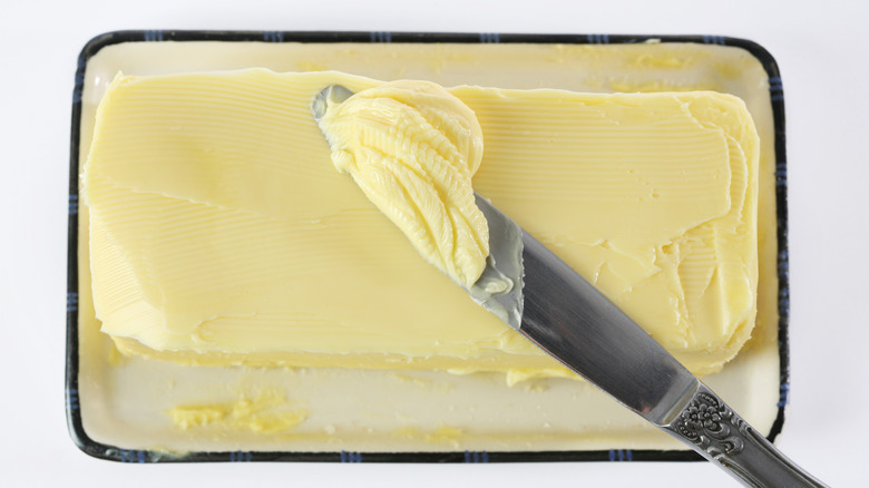 butter in dish with knife