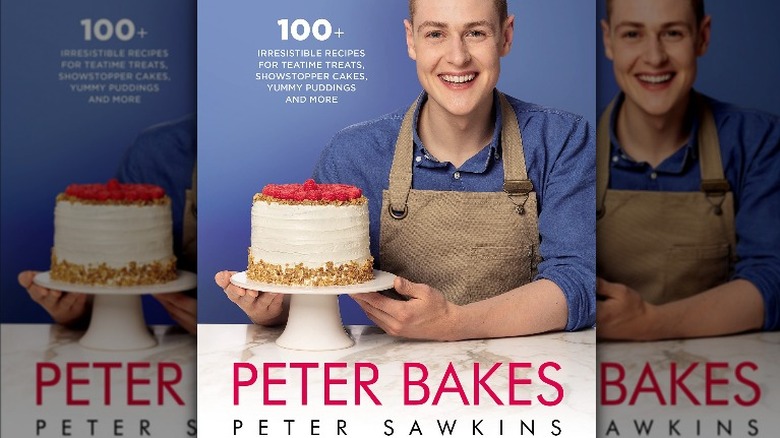 Peter Sawkins smiling with cake