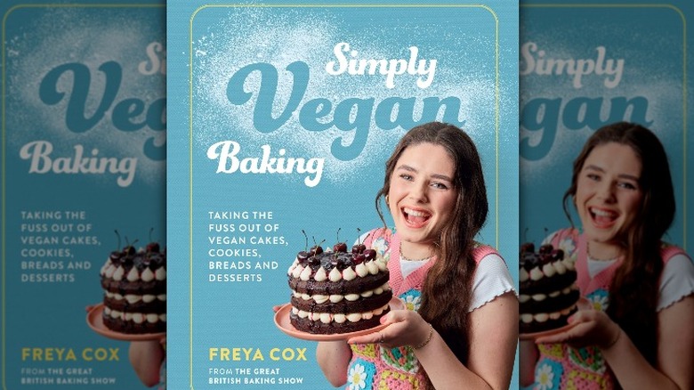 Freya Cox grinning with cake