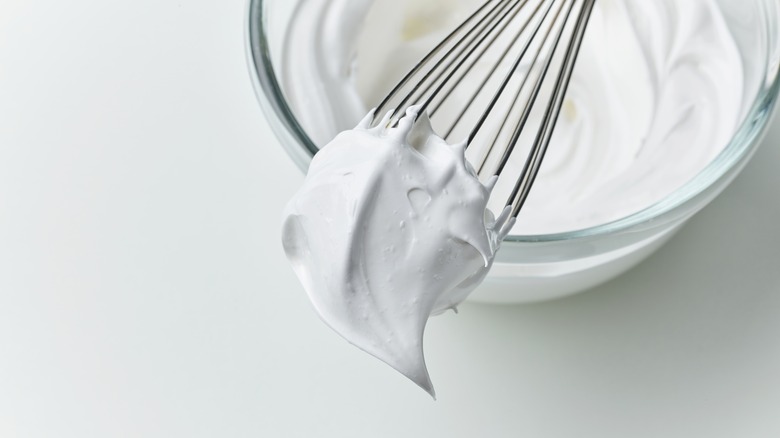 Whipped cream on whisk