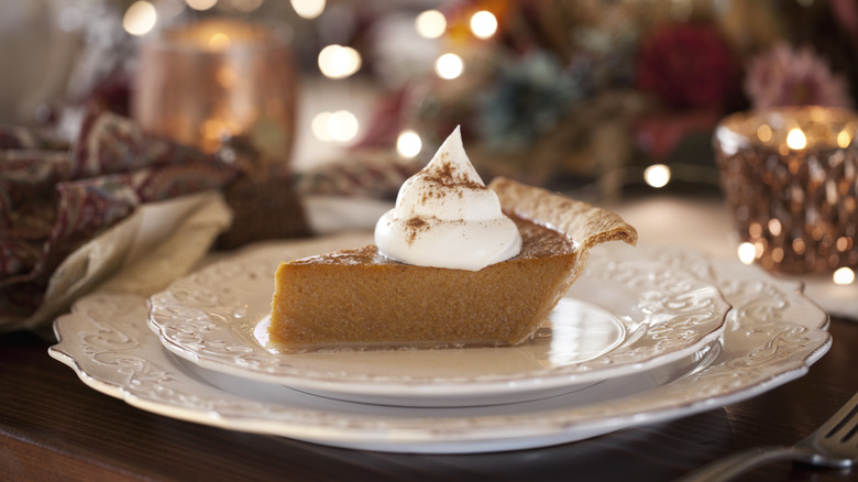 Pumpkin pie with whipped cream