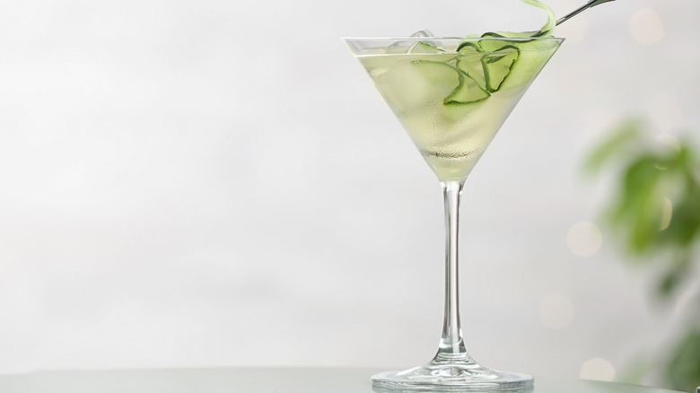 Gimlet with cucumber garnish