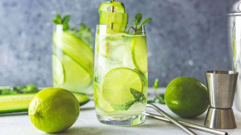 Cocktail with cucumber, mint, and lime