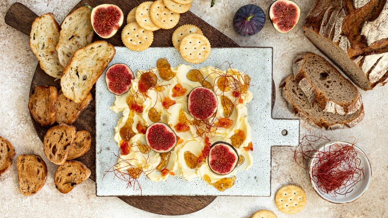 Butter board with various garnishes 