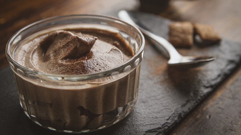 Delicious chocolate mousse in bowl 