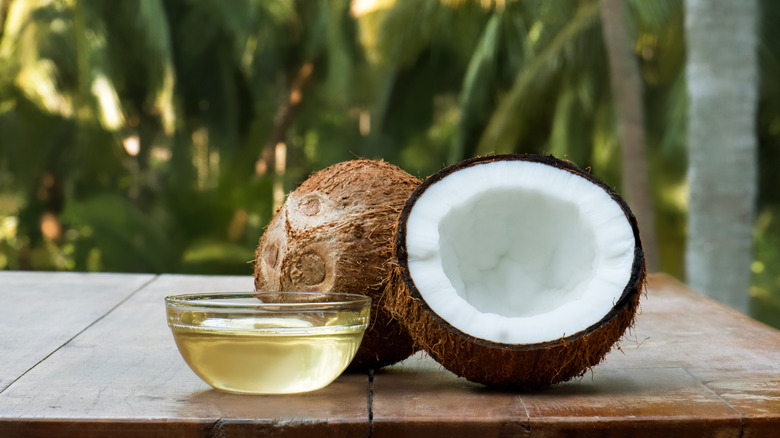 Coconut and bowl of vinegar