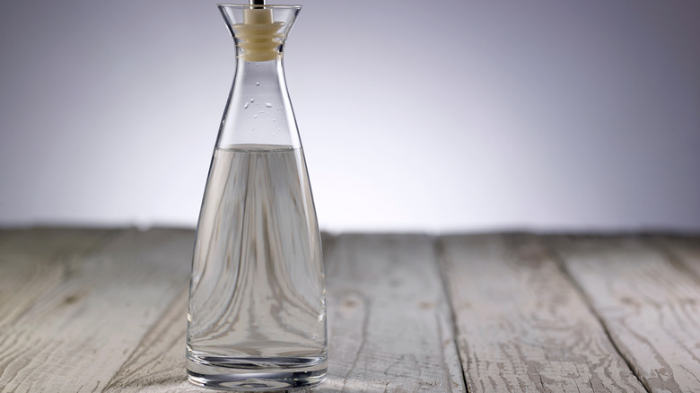 Bottle of distilled vinegar on table