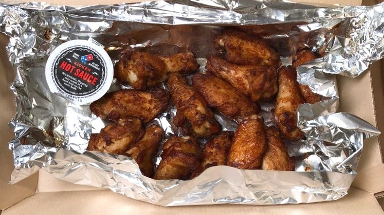 Domino's Kicker Hot Sauce and wings