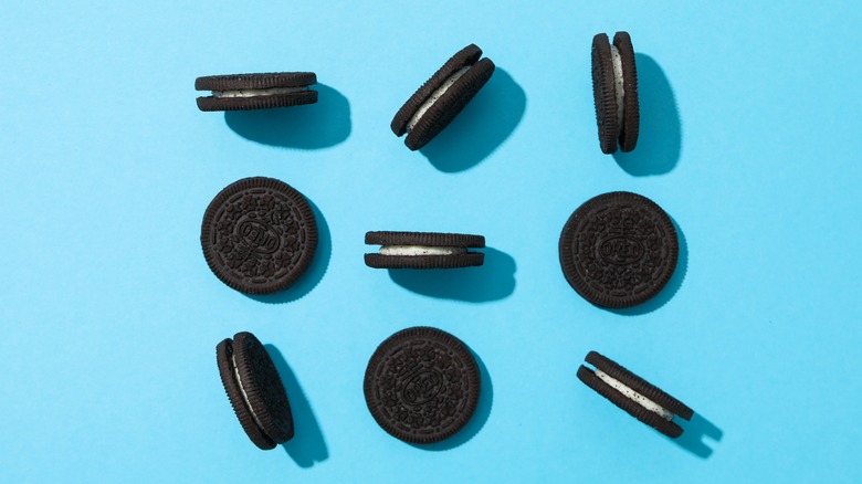 nine Oreos on blue background