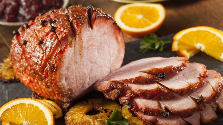 Roast ham with orange slices