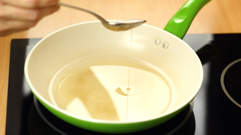 heating oil in frying pan