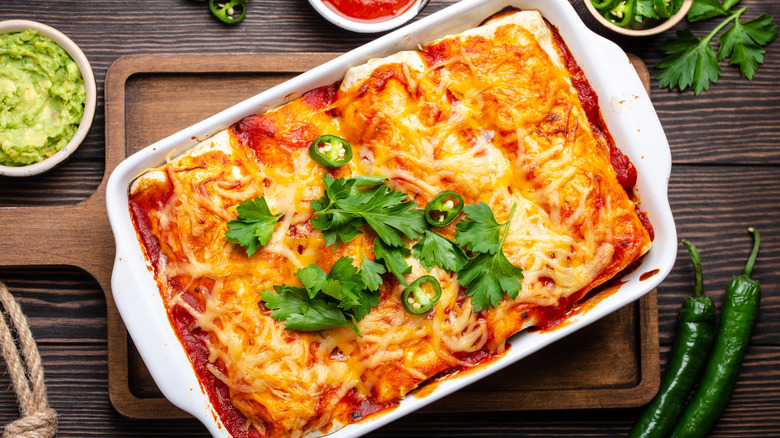 red enchiladas in casserole dish