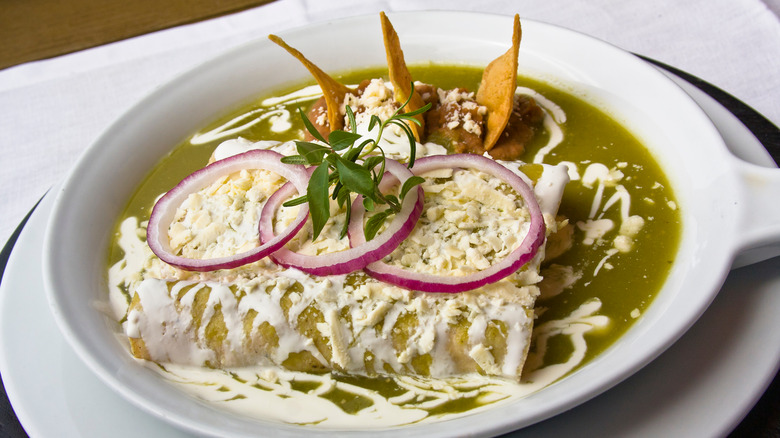 enchiladas suizas on white plate 