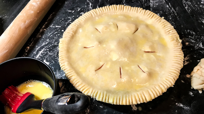 Pie crust being egg washed