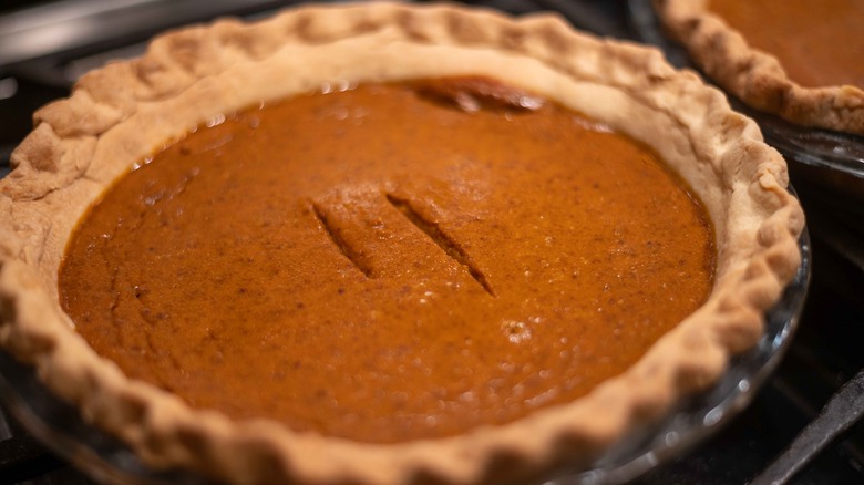 Pumpkin pie on rack