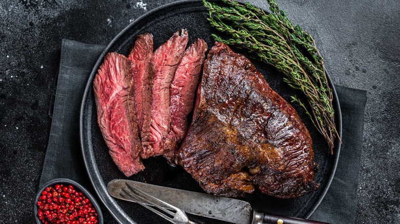 sliced hanger steak on plate