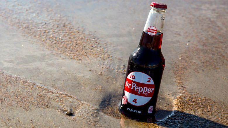 Dr Pepper bottle featuring 10,2,4 logo