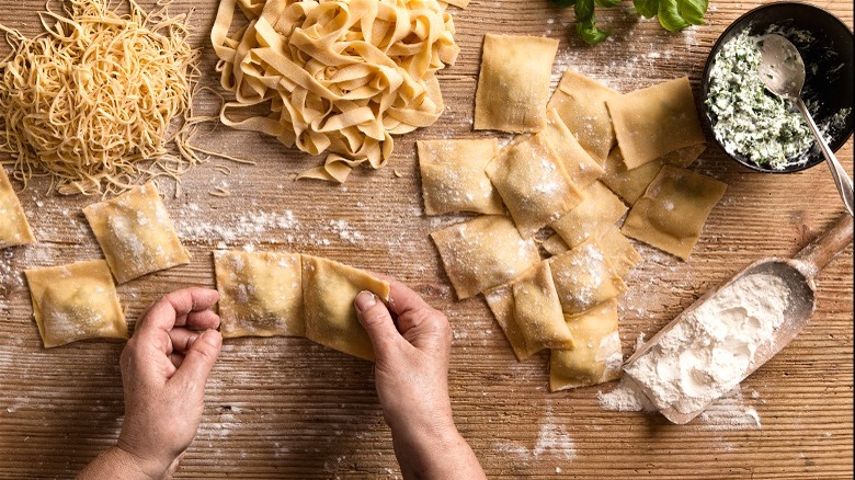 person making various pastas