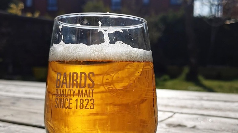 Beer in a Bairds glass on table