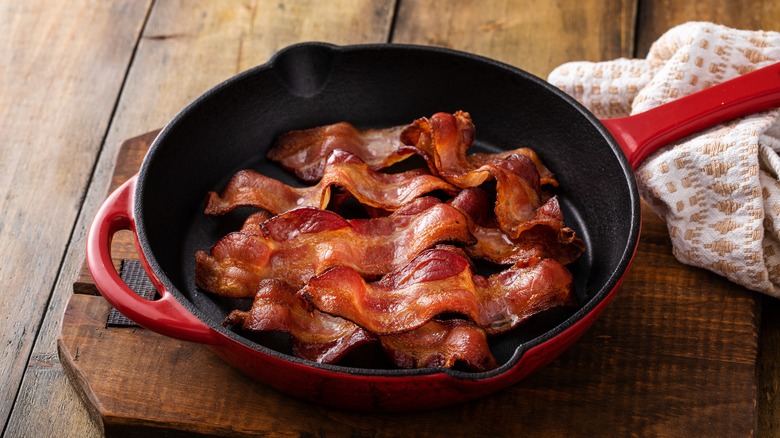 Cooked bacon in skillet