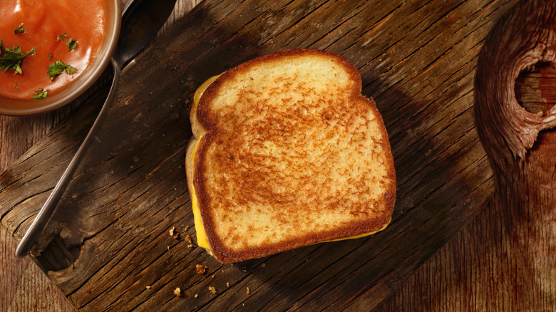 Grilled cheese on cutting board