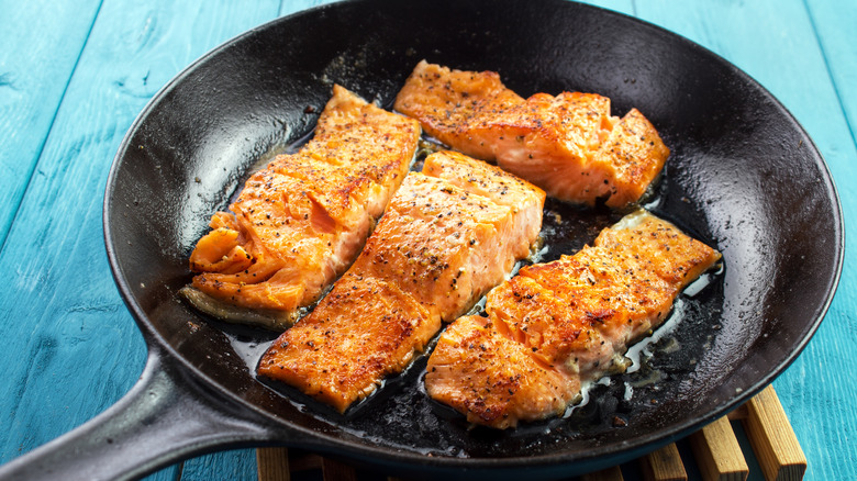 Salmon fillets in skillet