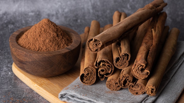 Cinnamon on wooden board