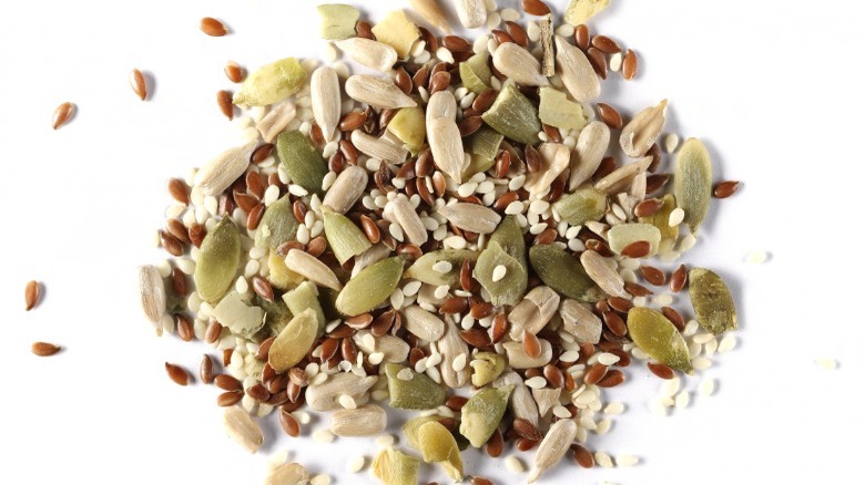 Mixed seeds on white background