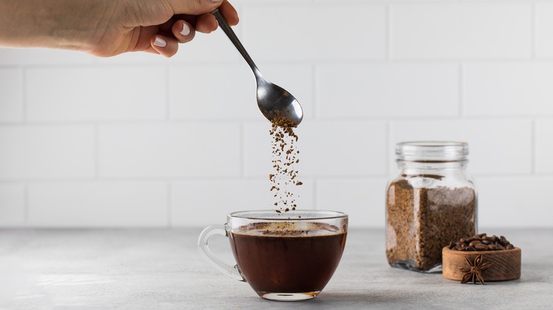 instant coffee pouring into cup