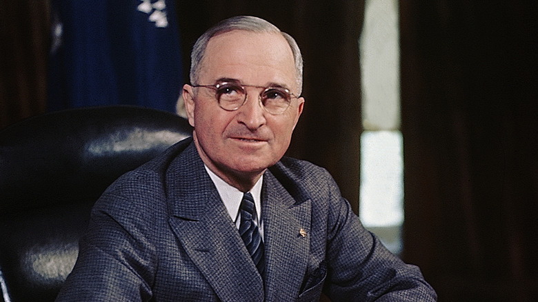 photo of Harry Truman seated