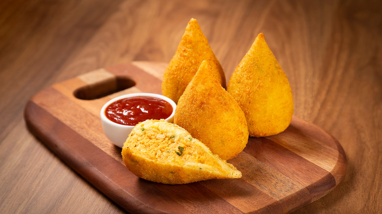 coxinha on board with sauce