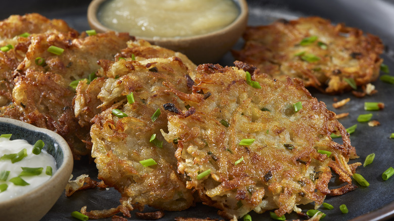 latkes with applesauce on plate