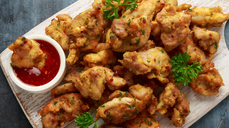 plate of pakora with sauce