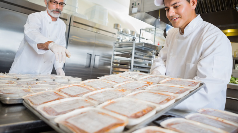 people preparing frozen meals