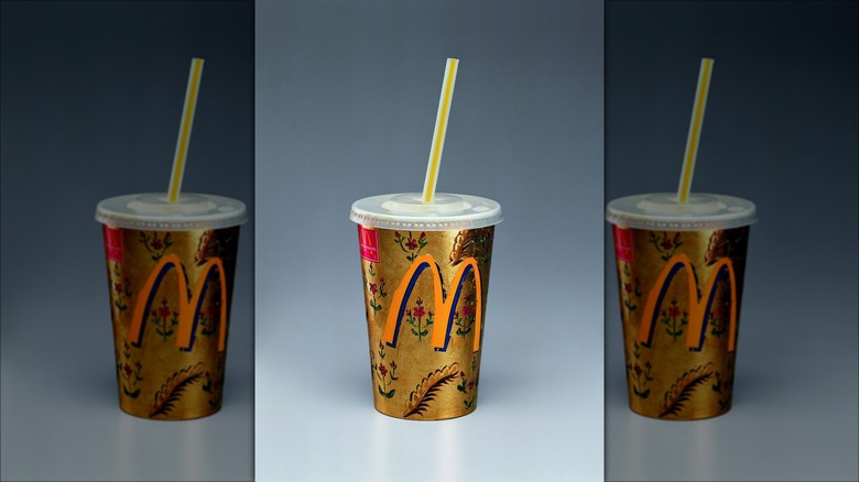 golden McDonald's art cup by Darío Escobar