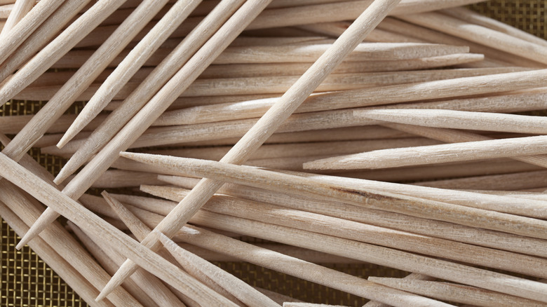 pile of toothpicks on mesh