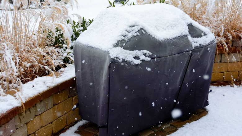 grill covered in the snow