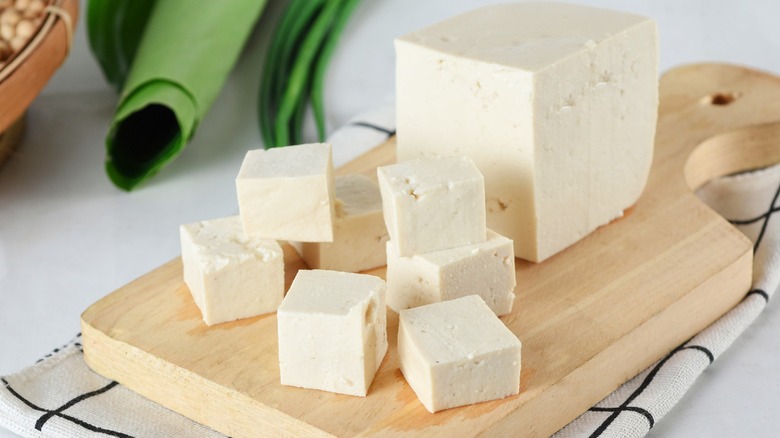 white tofu on wooden board