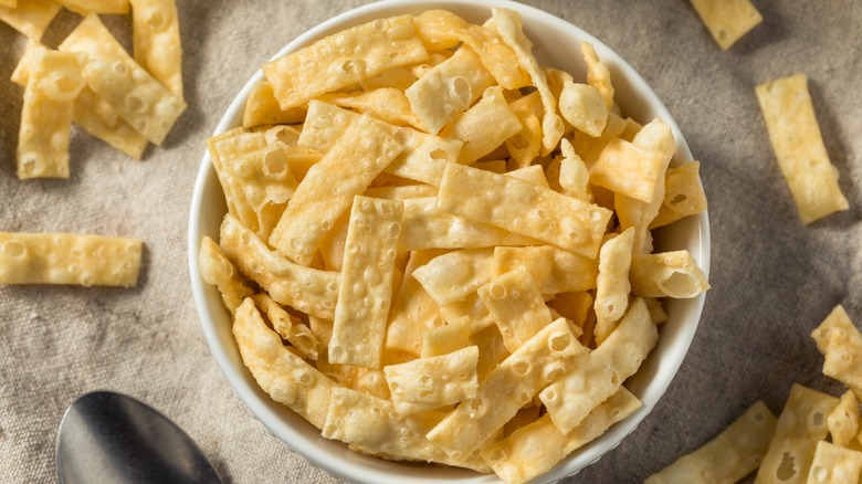 fried wonton strips in bowl