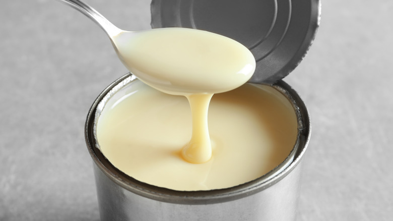 Spoon of thick condensed milk