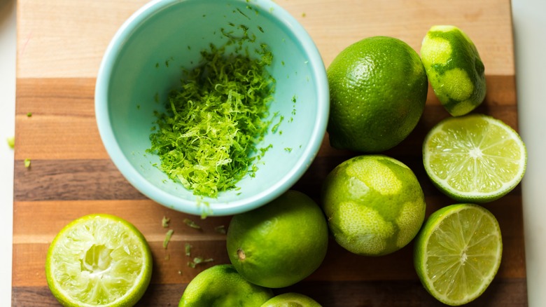 lime zest and halved limes