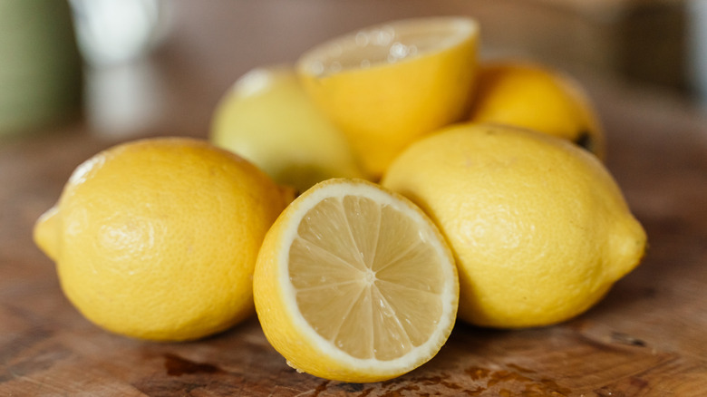 Halved and whole lemons