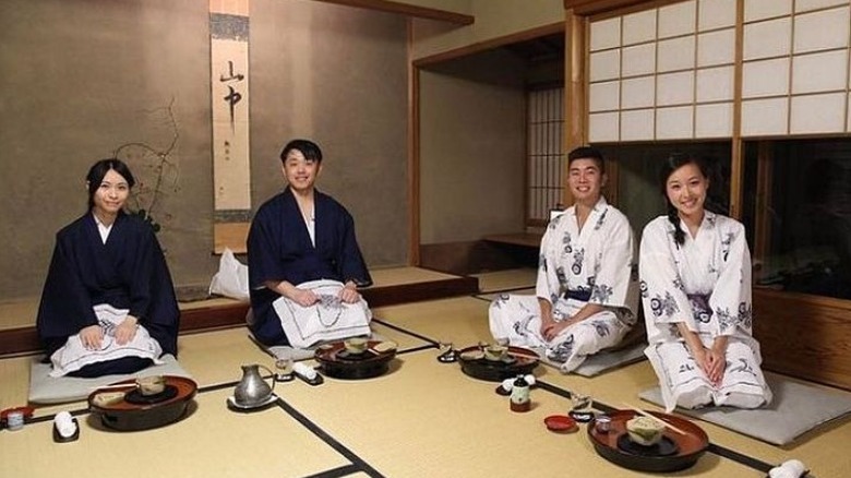 People kneeling on tatami