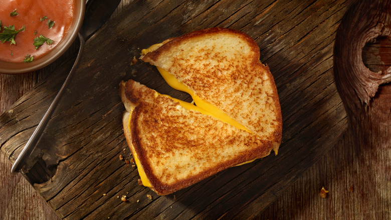 grilled cheese on wooden board