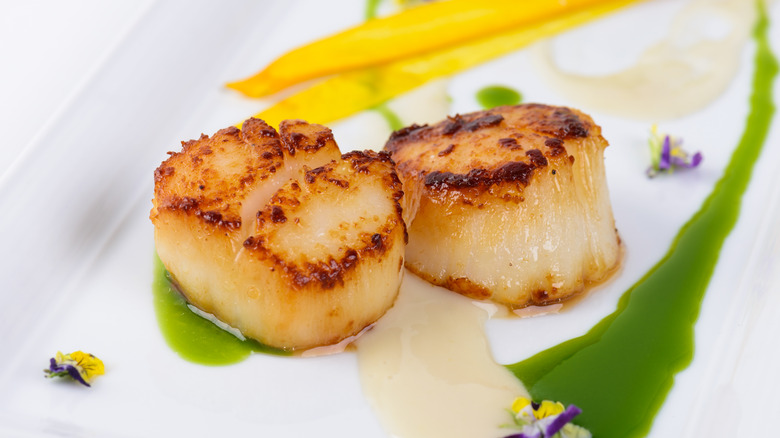 cooked scallops on plate