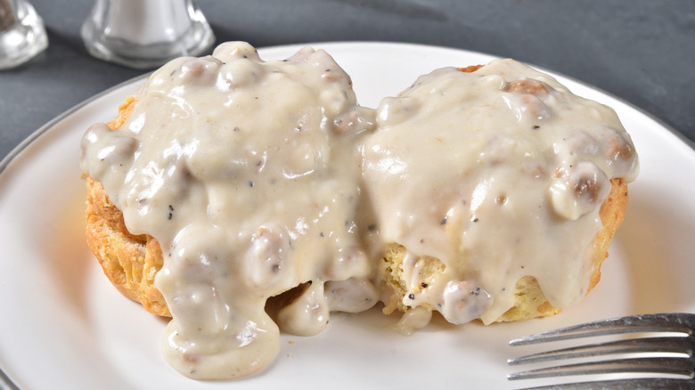 biscuits and gravy with fork