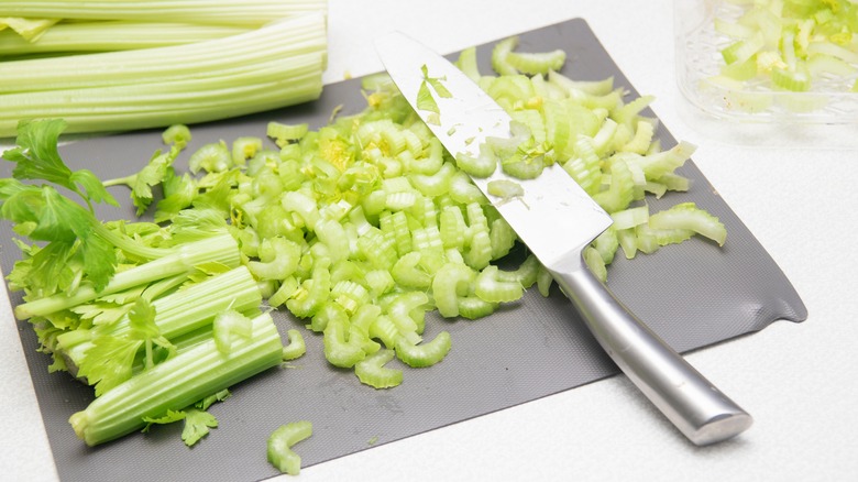 knife and chopped celery