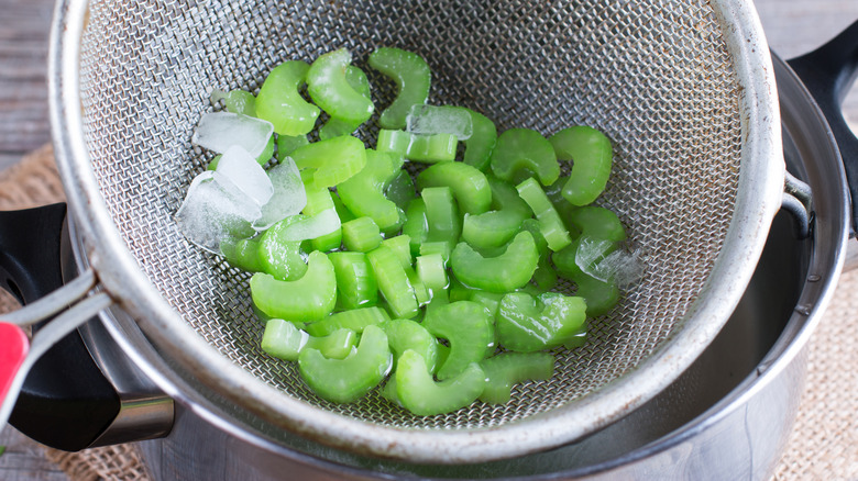 celery in strainer with ice