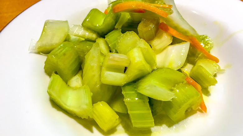 pickled celery with shredded carrots